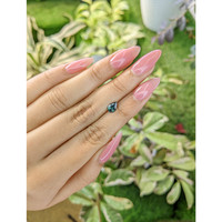 0.76 Ct. Bluish Green Sapphire from Madagascar Life Style