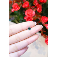 0.57 Ct. Bluish Green Sapphire from Thailand Life Style
