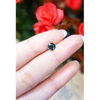 0.78 Ct. Bluish Green Sapphire from Thailand Life Style