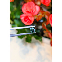 0.78 Ct. Bluish Green Sapphire from Thailand Life Style