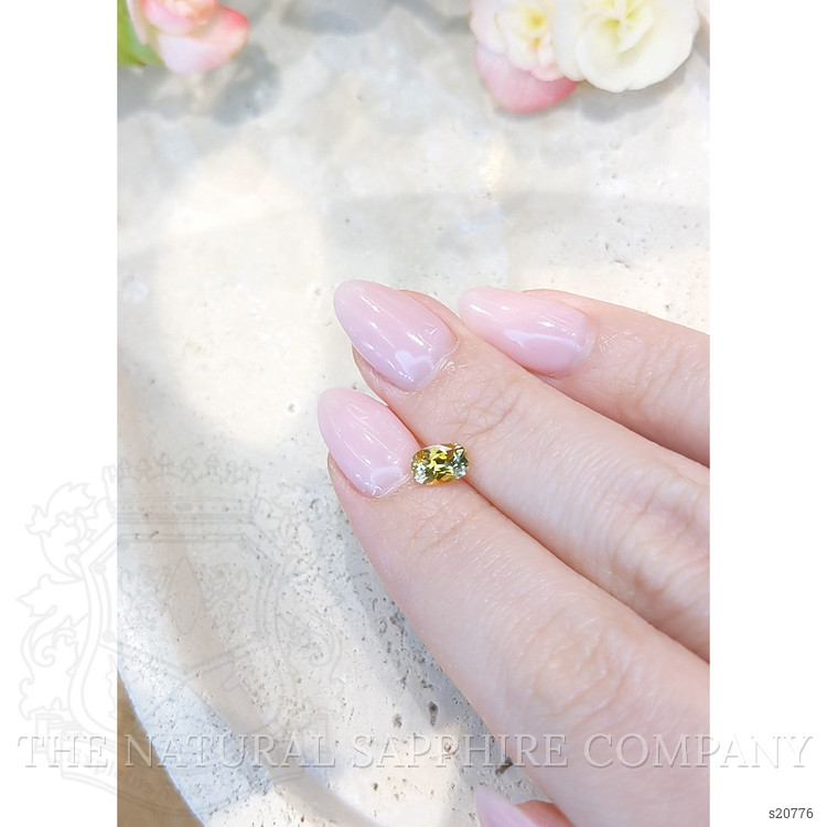 0.89 Ct. Orangish Yellow Sapphire from Montana