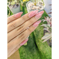 0.57 Ct. Peach Sapphire from Ceylon (Sri Lanka) Life Style