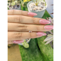 0.57 Ct. Peach Sapphire from Ceylon (Sri Lanka) Life Style