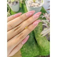 0.87 Ct. Orangish Yellow Sapphire from Ceylon (Sri Lanka) Life Style