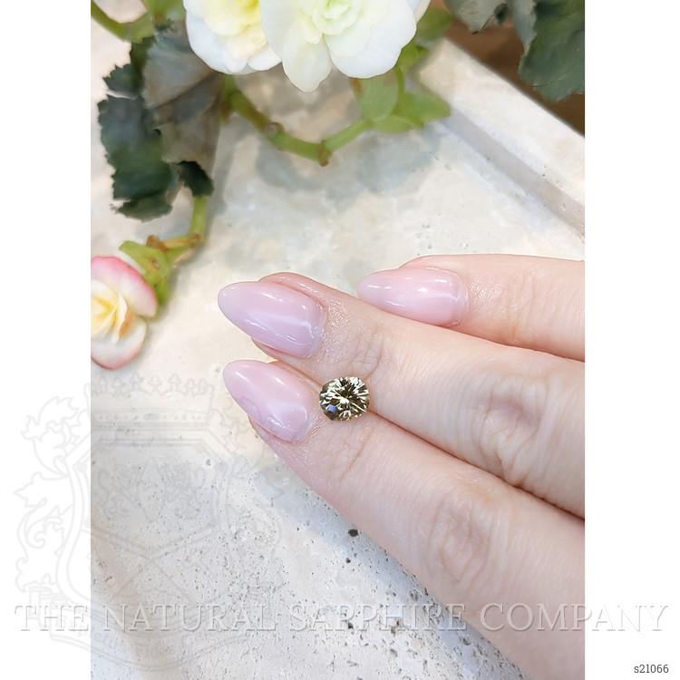 1.62 Ct. Greenish Yellow Sapphire from Montana