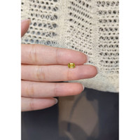 0.82 Ct. Greenish Yellow Sapphire from Madagascar Life Style
