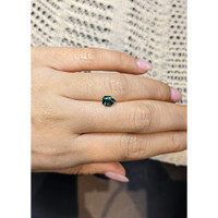 0.98 Ct. Bluish Green Sapphire from Madagascar Life Style