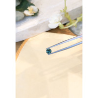 0.90 Ct. Greenish Blue Sapphire from Madagascar Life Style