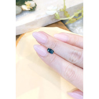 0.96 Ct. Bluish Green Sapphire from Madagascar Life Style