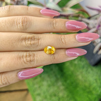 2.51 Ct. Orangish Yellow Sapphire from Ceylon (Sri Lanka) Life Style