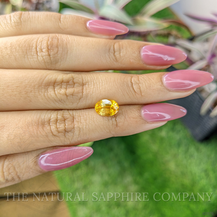 2.51 Ct. Orangish Yellow Sapphire from Ceylon (Sri Lanka)