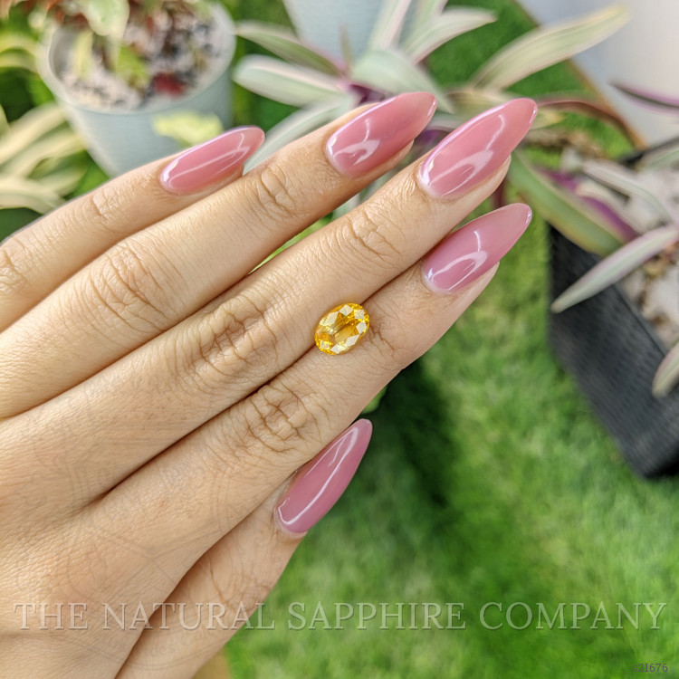 2.51 Ct. Orangish Yellow Sapphire from Ceylon (Sri Lanka)