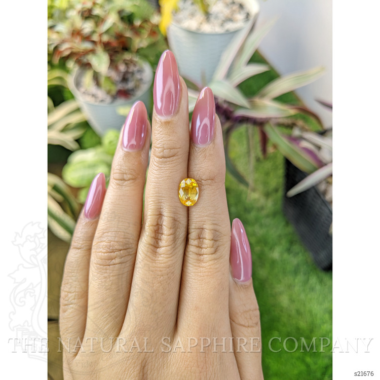 2.51 Ct. Orangish Yellow Sapphire from Ceylon (Sri Lanka)