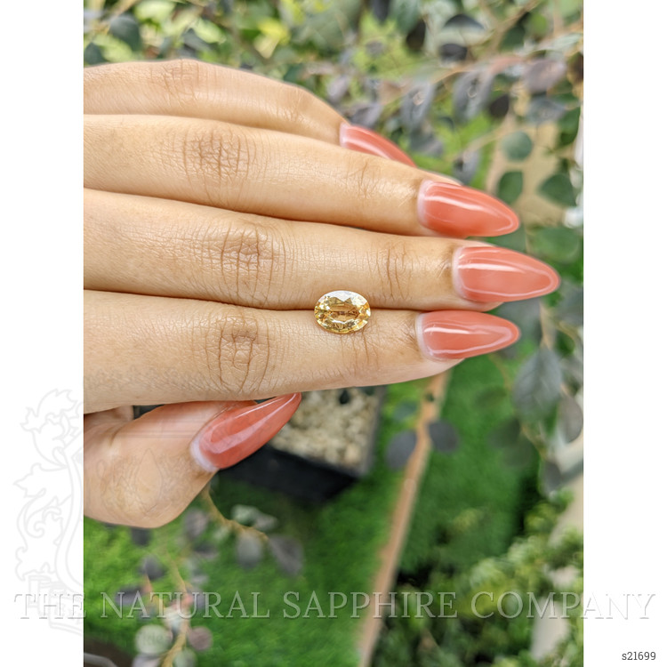 2.33 Ct. Orangish Yellow Sapphire from Ceylon (Sri Lanka)