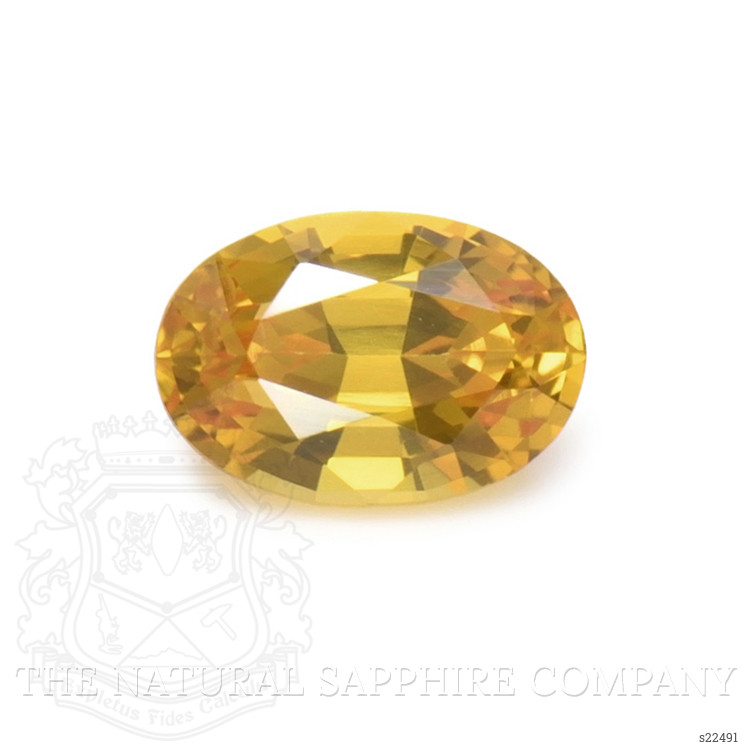 0.69 Ct. Orangish Yellow Sapphire from Ceylon (Sri Lanka)