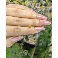 0.50 Ct. Orangish Yellow Sapphire from Ceylon (Sri Lanka) Life Style