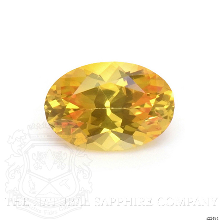 0.54 Ct. Orangish Yellow Sapphire from Ceylon (Sri Lanka)