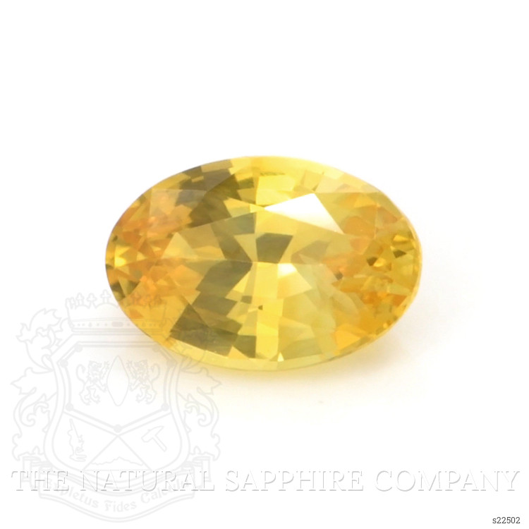 0.54 Ct. Orangish Yellow Sapphire from Ceylon (Sri Lanka)