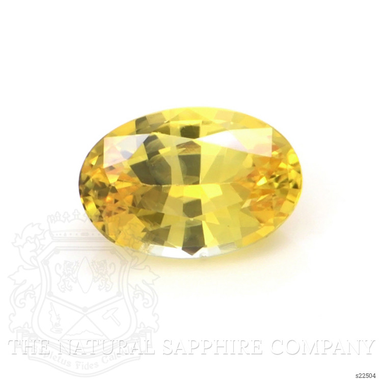 0.60 Ct. Orangish Yellow Sapphire from Ceylon (Sri Lanka)