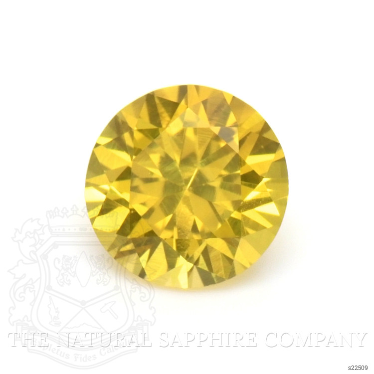 0.58 Ct. Orangish Yellow Sapphire from Ceylon (Sri Lanka)