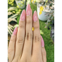 0.60 Ct. Orangish Yellow Sapphire from Ceylon (Sri Lanka) Life Style