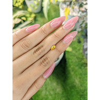 0.60 Ct. Orangish Yellow Sapphire from Ceylon (Sri Lanka) Life Style