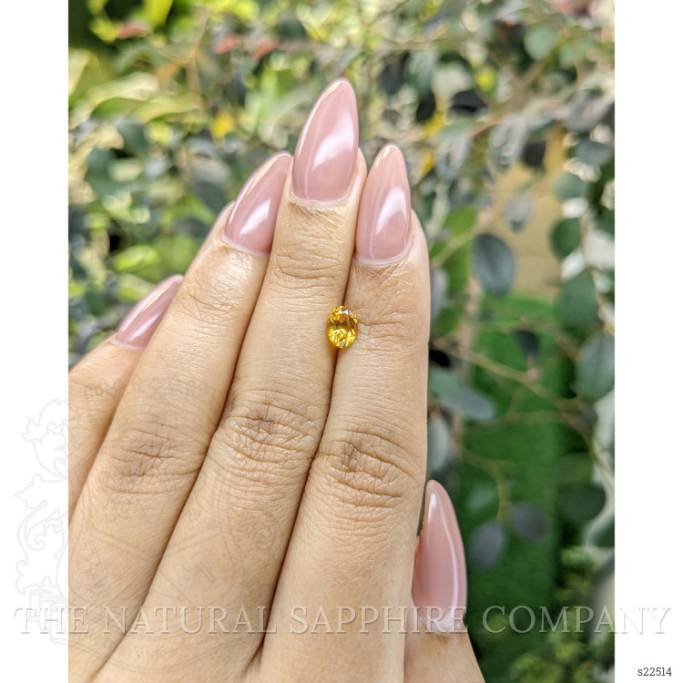 0.75 Ct. Yellowish Orange Sapphire from Ceylon (Sri Lanka)