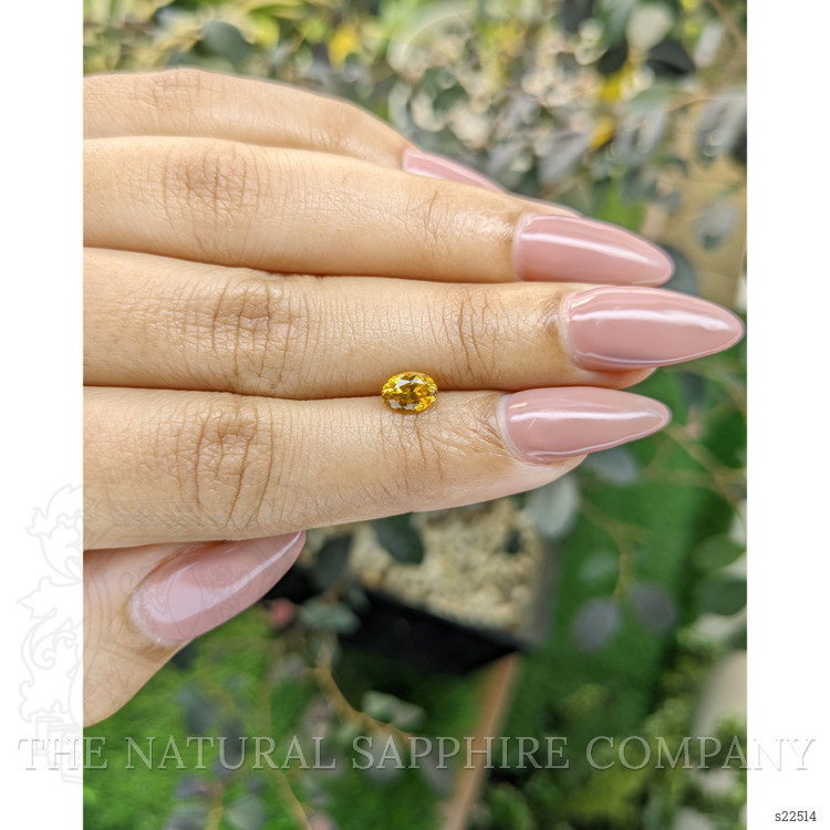 0.75 Ct. Yellowish Orange Sapphire from Ceylon (Sri Lanka)