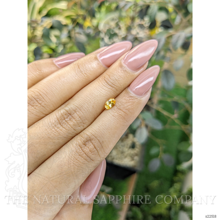 0.45 Ct. Orangish Yellow Sapphire from Ceylon (Sri Lanka)