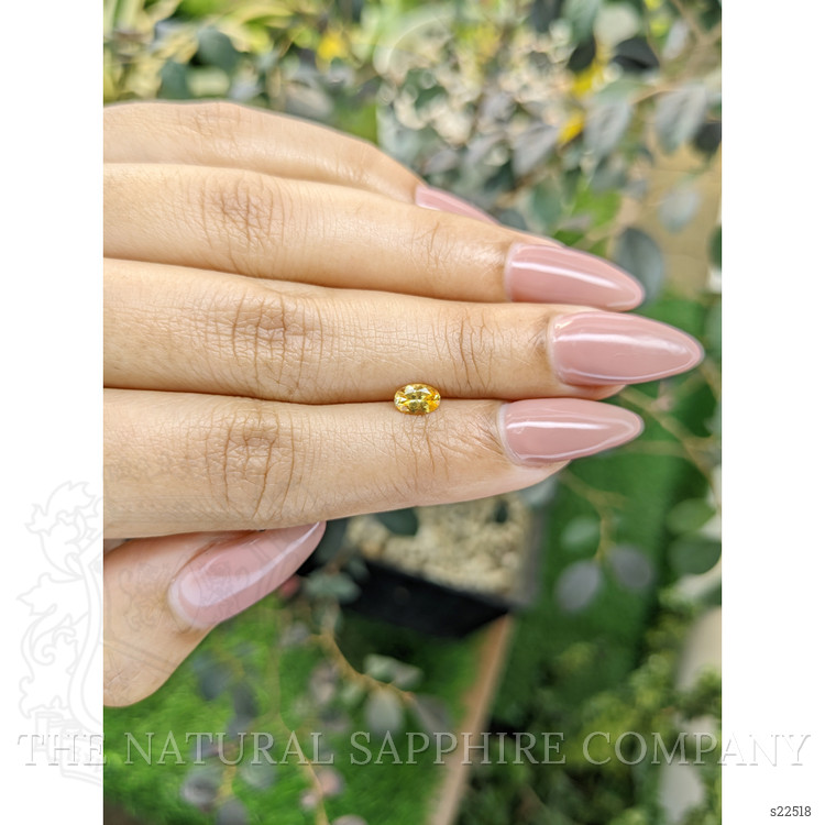 0.45 Ct. Orangish Yellow Sapphire from Ceylon (Sri Lanka)