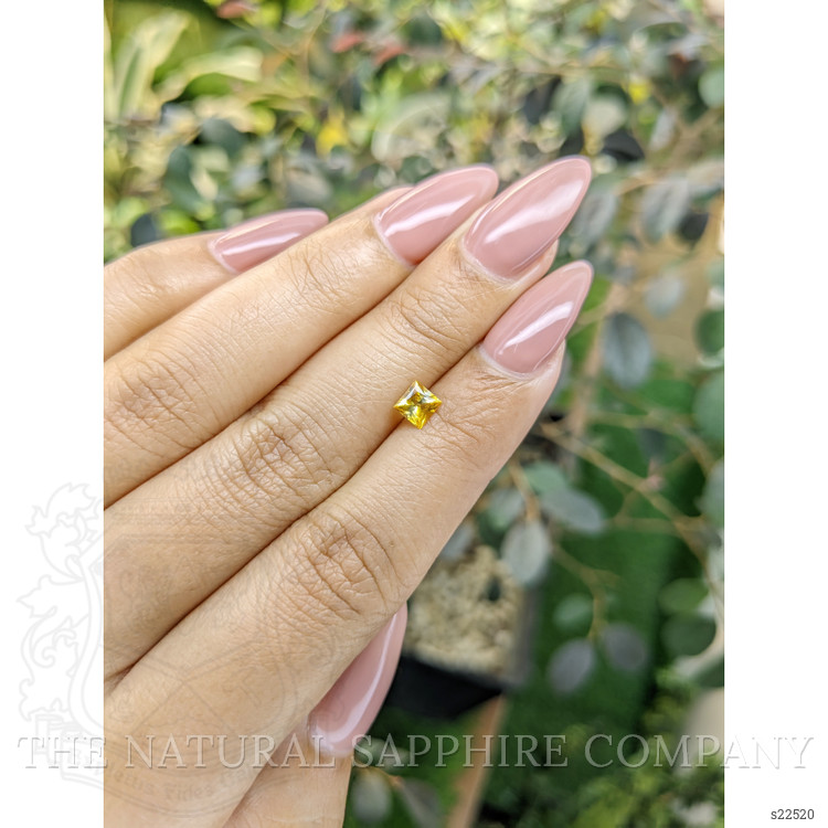 0.52 Ct. Orangish Yellow Sapphire from Ceylon (Sri Lanka)