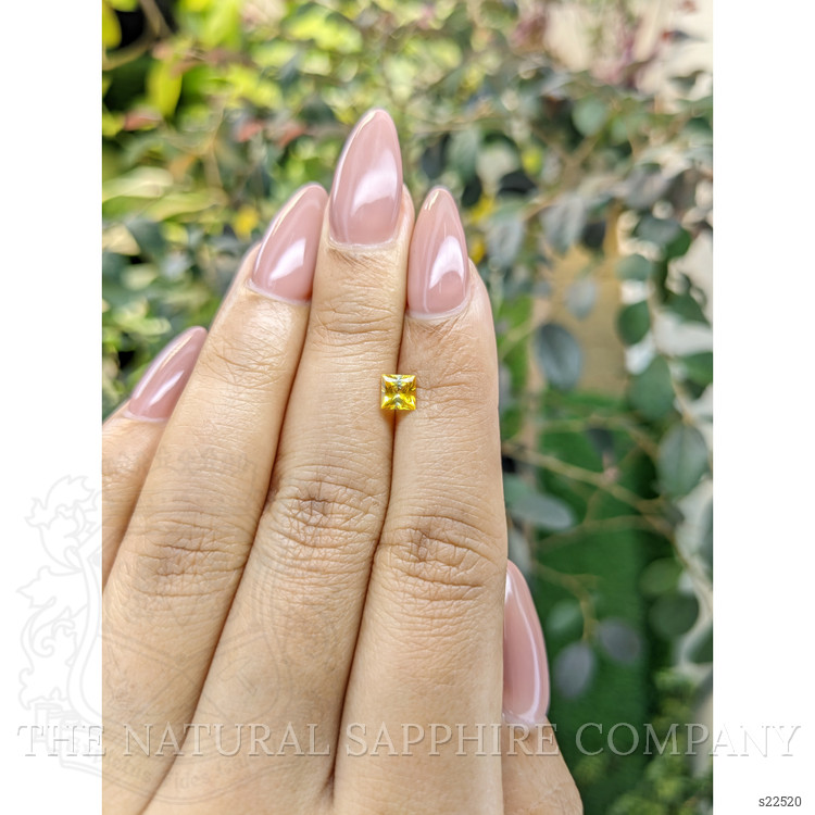 0.52 Ct. Orangish Yellow Sapphire from Ceylon (Sri Lanka)