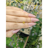 0.54 Ct. Orangish Yellow Sapphire from Ceylon (Sri Lanka) Life Style