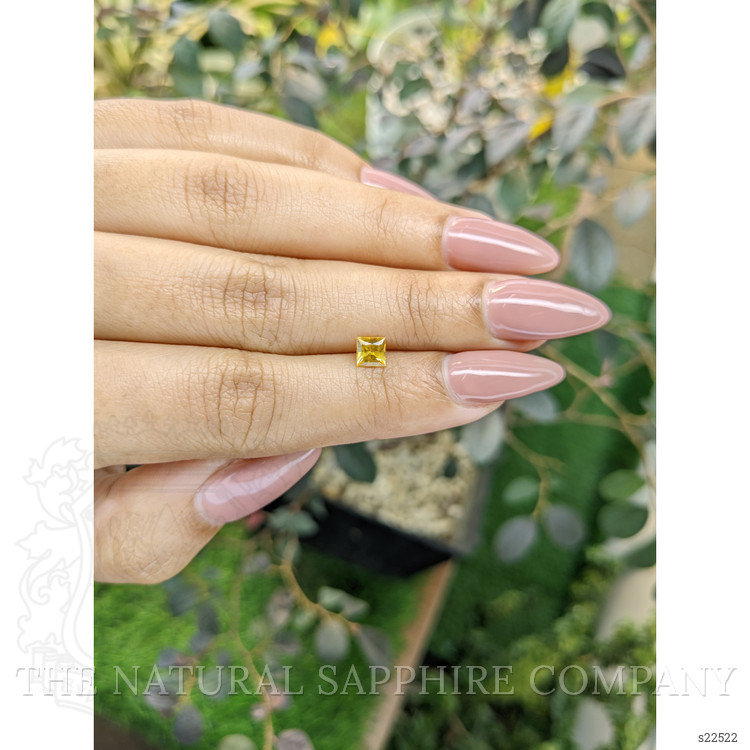 0.54 Ct. Orangish Yellow Sapphire from Ceylon (Sri Lanka)