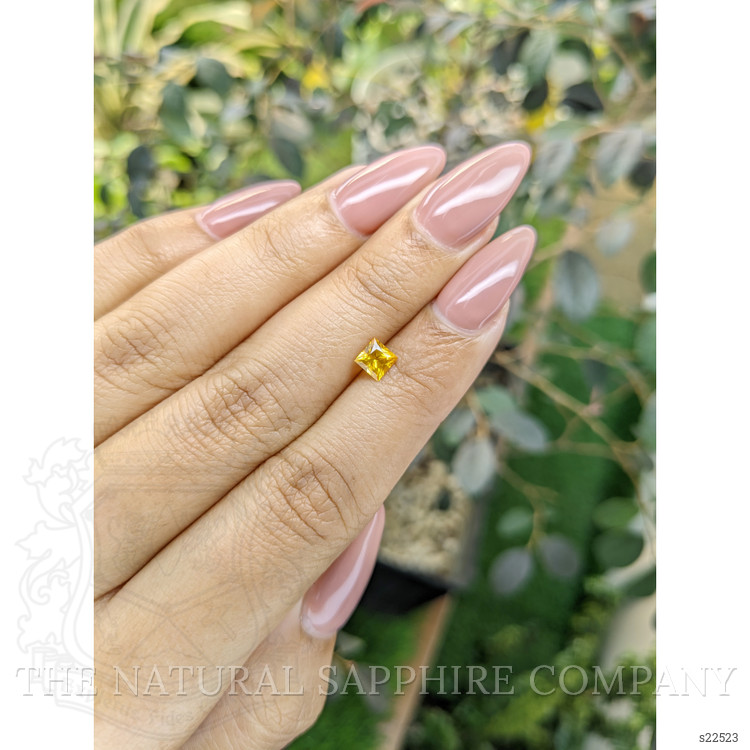 0.59 Ct. Orangish Yellow Sapphire from Ceylon (Sri Lanka)