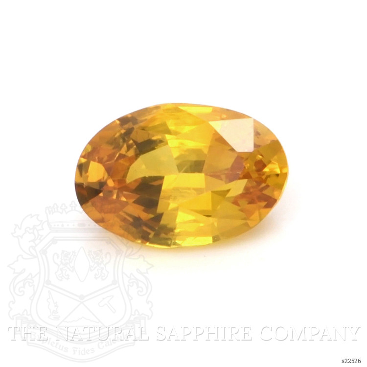 0.57 Ct. Orangish Yellow Sapphire from Ceylon (Sri Lanka)