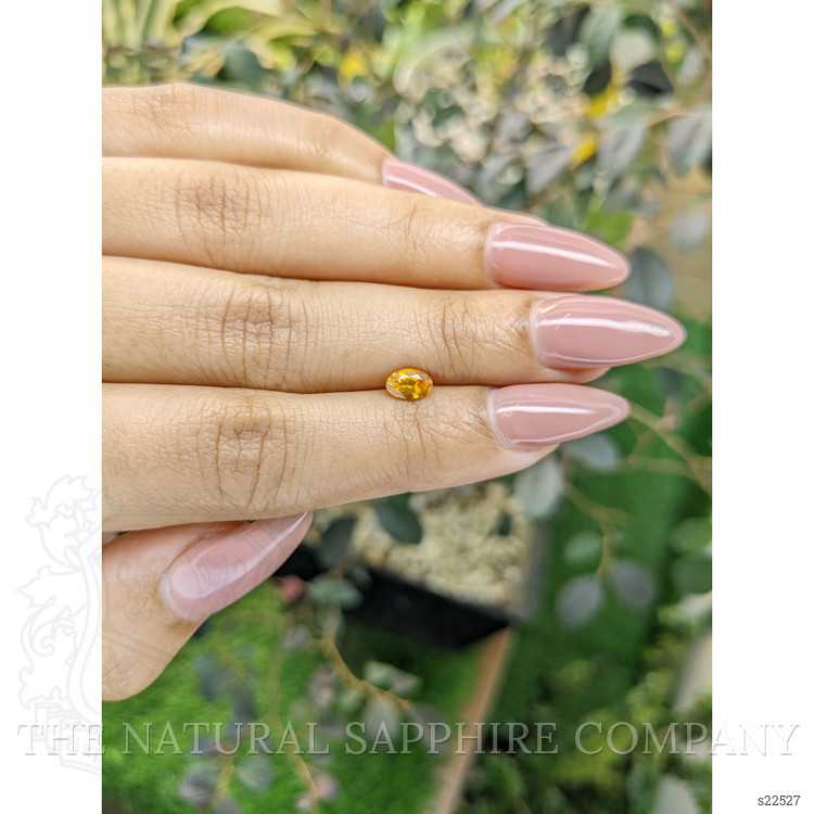 0.58 Ct. Yellowish Orange Sapphire from Ceylon (Sri Lanka)
