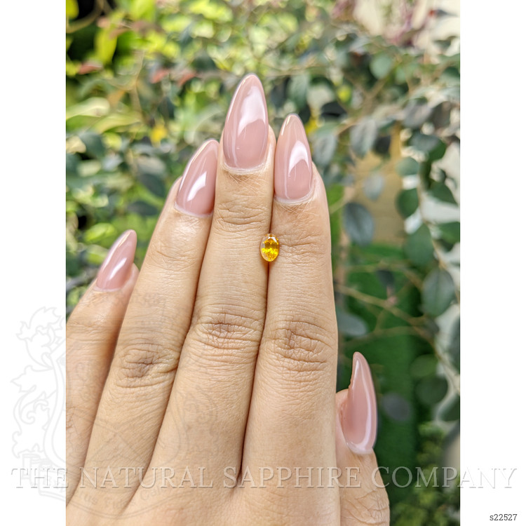 0.58 Ct. Yellowish Orange Sapphire from Ceylon (Sri Lanka)