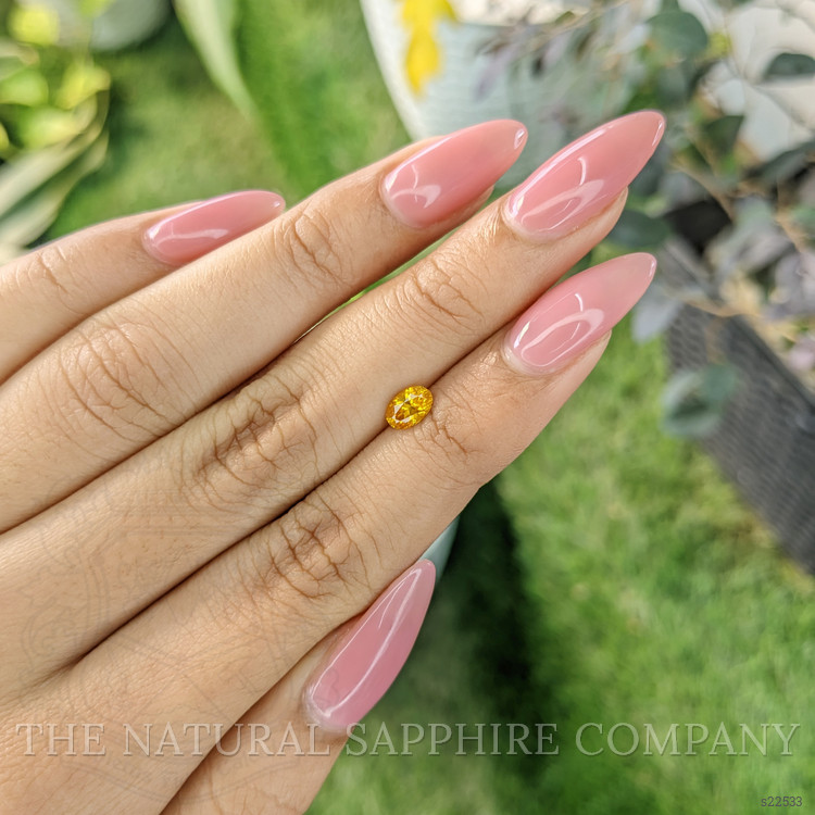 0.60 Ct. Yellowish Orange Sapphire from Ceylon (Sri Lanka)