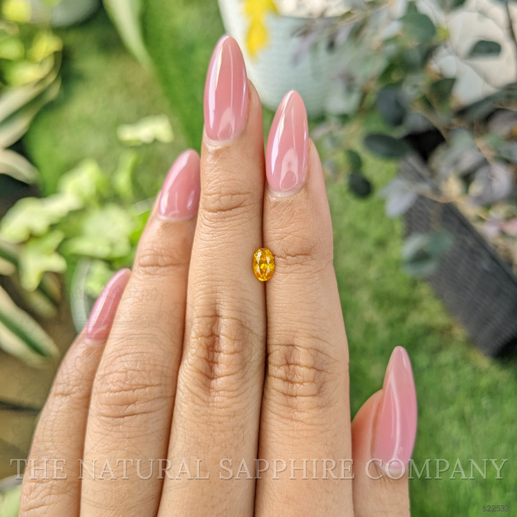 0.60 Ct. Yellowish Orange Sapphire from Ceylon (Sri Lanka)