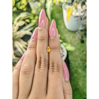 0.58 Ct. Orangish Yellow Sapphire from Ceylon (Sri Lanka) Life Style