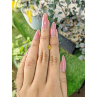 0.49 Ct. Orangish Yellow Sapphire from Ceylon (Sri Lanka) Life Style