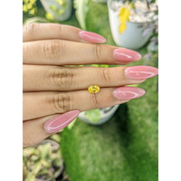 0.84 Ct. Orangish Yellow Sapphire from Ceylon (Sri Lanka) Life Style