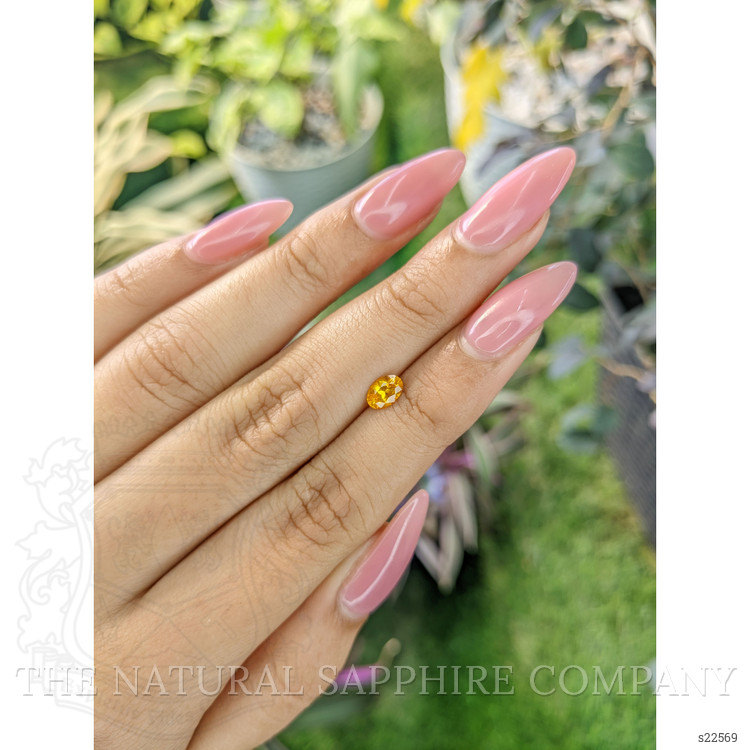 0.53 Ct. Yellowish Orange Sapphire from Ceylon (Sri Lanka)