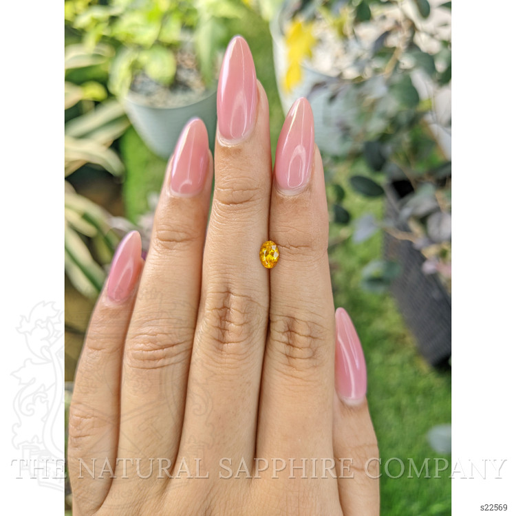 0.53 Ct. Yellowish Orange Sapphire from Ceylon (Sri Lanka)
