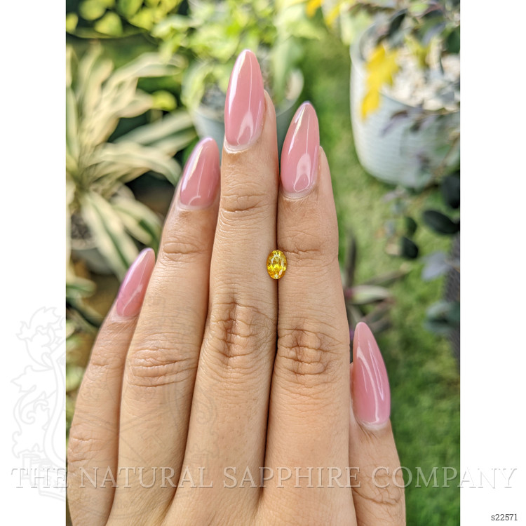 0.51 Ct. Orangish Yellow Sapphire from Ceylon (Sri Lanka)