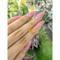 0.54 Ct. Orangish Yellow Sapphire from Ceylon (Sri Lanka) Life Style