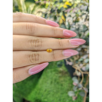 0.51 Ct. Orangish Yellow Sapphire from Ceylon (Sri Lanka) Life Style