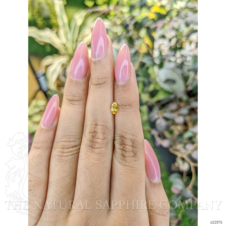 0.40 Ct. Orangish Yellow Sapphire from Ceylon (Sri Lanka)