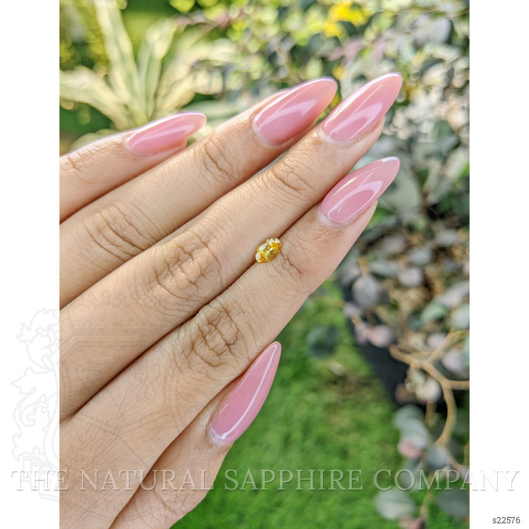 0.40 Ct. Orangish Yellow Sapphire from Ceylon (Sri Lanka)